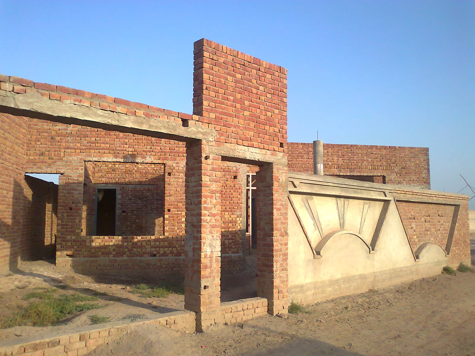 A house under construction in Makhdoom Rashid in Multan District